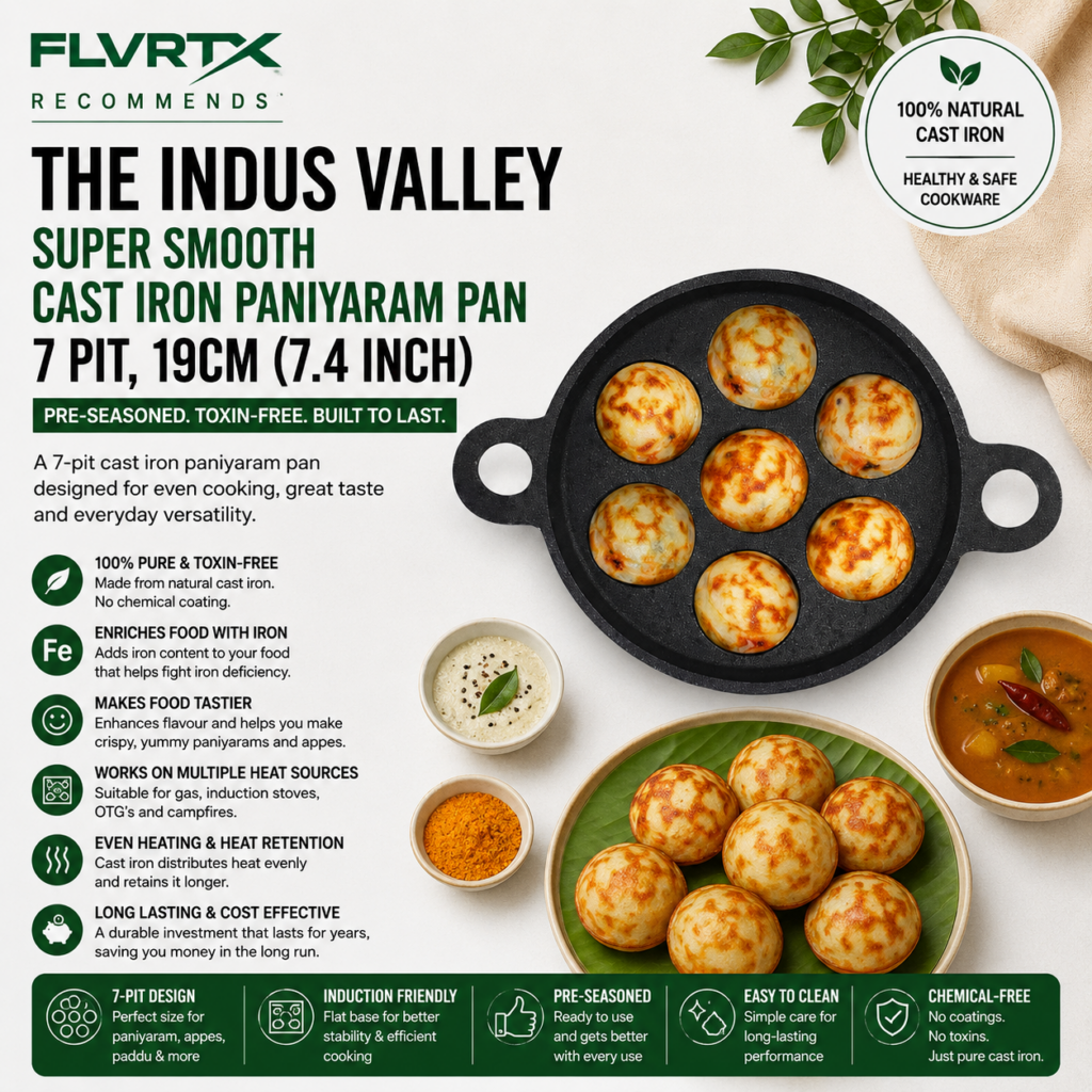 The Indus Valley 7-pit cast iron paniyaram pan with cooked paniyaram